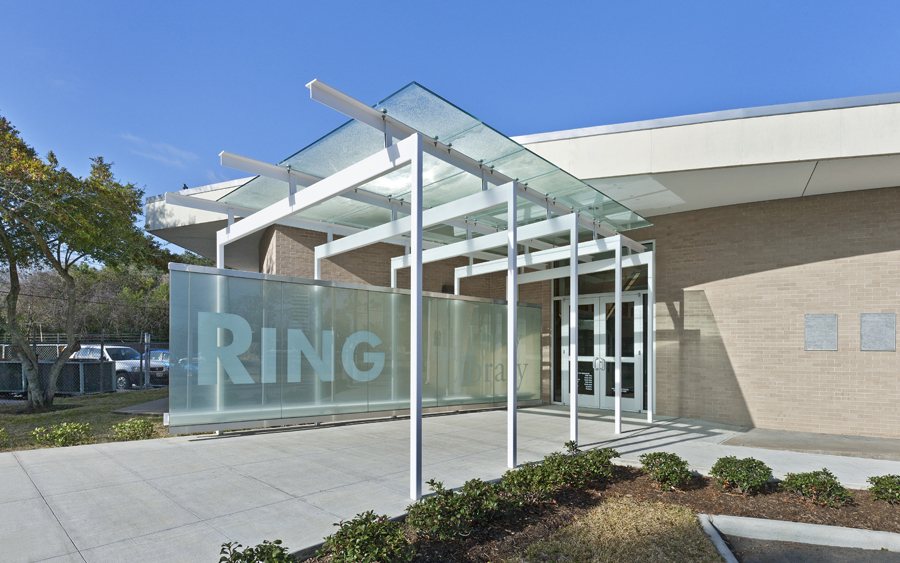 The glass entrance canopy and RING sign at Ring Neighborhood Library